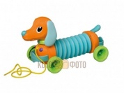 Игрушка развивающая Tomy муз.игр.каталка на веревочке Щенок Марли - Гармошка.